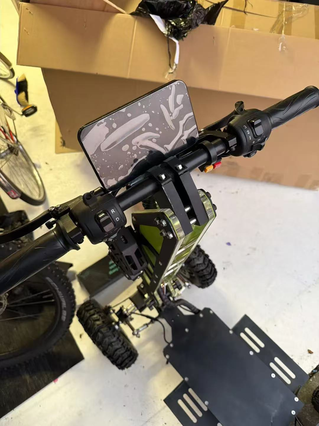 Customer photo showing handlebar controls